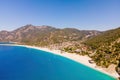 Aerial wide shot of Oludeniz resort village on Aegean sea coast in Turkey