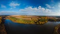 Aerial wide view of lake at sunrise in autumn. Meadows, orange grass. Colorful landscape of river sunset. Horodok Ukraine Royalty Free Stock Photo