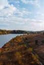 Aerial wide view of lake at sunrise in autumn. Meadows, orange grass, trees. Colorful landscape of river sunset. Horodok Ukraine Royalty Free Stock Photo