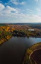 Aerial wide view of lake at sunrise in autumn. Vertical photo. Colorful landscape of river sunset. Horodok Ukraine Fishermen by Royalty Free Stock Photo