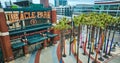 Aerial Willie Mays Gate Oracle Park front entrance with statue and palm trees