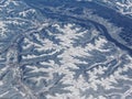 Aerial winter snow landscape view of rural and city land between Minneapolis Minnesota and Indianapolis Indiana with stark contras