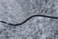 Aerial winter view of the curvy mountain road