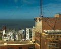 Aerial workers on tall building