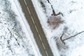 aerial zenithal drone view of a road in a snowy landscape Royalty Free Stock Photo