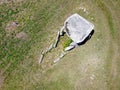 Aerial top view of a dolmen, a prehistoric tomb, ancient burial
