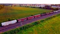 Aerian view of a freight train in the countryside