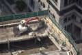 Aeriel view of construction project located on top roof of large commercial building in Los Angeles CA. Royalty Free Stock Photo