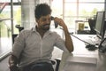 Aero American business man having conversation on Landline phone Royalty Free Stock Photo