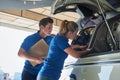 Aero Engineer And Apprentice Working On Helicopter In Hangar Royalty Free Stock Photo