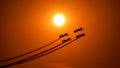 Aerobatic air plane on blue sky, aerobatic pilots on sunset