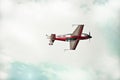 Aerobatic aircraft performs maneuvre in the sky Royalty Free Stock Photo