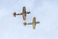 Aerobatic airplane pilot Jurgis Kairys training in the sky of the city. Colored airplane with trace smoke, airbandits, aeroshow