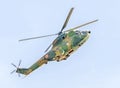 Aerobatic elicopter pilots training in the sky of the city. Puma elicopter, navy, army drill Royalty Free Stock Photo