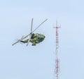 Aerobatic elicopter pilots training in the sky of the city. Puma elicopter, navy, army drill Royalty Free Stock Photo