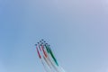 Aerobatic maneuver during Frecce Tricolori air show under a blue sky Royalty Free Stock Photo