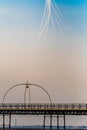 An aerobatic stunt team performs a display over Southport at dusk, looping down and performing a syncronised break with Royalty Free Stock Photo