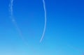 Aerobatic team performing on the event, blue sky background Royalty Free Stock Photo