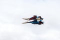 Aerobatics. Two fighters. Mirror Royalty Free Stock Photo