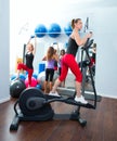 Aerobics cardio training woman on elliptic Royalty Free Stock Photo