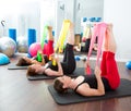 Aerobics pilates women with rubber bands in a row Royalty Free Stock Photo