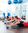 Aerobics pilates women with toning balls in a row Royalty Free Stock Photo