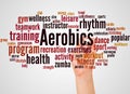 Aerobics word cloud and hand with marker concept Royalty Free Stock Photo