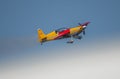 Aeroclub of Romania performing aerial acrobatics at BIAS 2023, Extra 330SC plane.