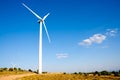 Aerogenerator wind mill in sunny blue sky