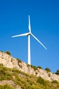 Aerogenerator windmill in rocky mountain Royalty Free Stock Photo