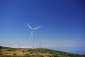 Aerogenerator Windmills In Front Of Ocean Sea