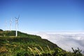 Aerogenerator Windmills In Front Of Ocean Sea