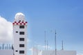 Aeronautical meteorological station tower or weather radar dome station tower in airport Royalty Free Stock Photo