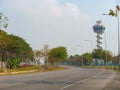 Aeronautical radio tower beside curve road in airport area