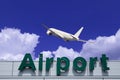 Aeroplane Clouds And Airport sign