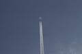 Aeroplane leaving a track of smoke in sky, Maharashtra, India