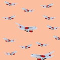 Aeroplane pattern on pink background.