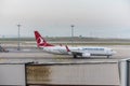 Aeroplane of Pegasus Airlines taxiing in Istanbul Sabiha Gokcen International Airport in the early morning in Istanbul, Turkey