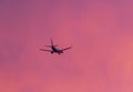 Aeroplane silhouetted against a beautiful sunset