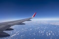 Aeroplane wing view from window beautiful sky. Traveling concept Royalty Free Stock Photo