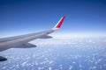 Aeroplane wing view from window beautiful sky. Traveling concept Royalty Free Stock Photo