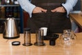 Aeropress details. Coffee alternative making by barista in the cafe. Barista prepare aeropress to pour it. Advert for
