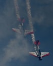 Aeroshell Aerobatic Team Diving Through Smoke Royalty Free Stock Photo