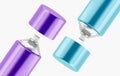 Aerosol bottles with open lids, spray cans of purple and blue paint, close up mockup of cosmetic packaging. Empty Royalty Free Stock Photo