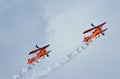 Aerosuperbatics  wing walking display team two aeroplanes in flight. Royalty Free Stock Photo