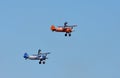 The Aerosuperbatics wing-walking team flying vintage 1940s Boeing Stearman biplanes Royalty Free Stock Photo