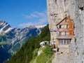 Aescher, Switzerland's iconic cliffhanging mountain restaurant, most beautiful place in world. Alpstein, Appenzell.