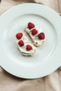 Aesthetic breakfast, cream cheese and raspberries