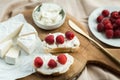 Aesthetic breakfast camembert, cream cheese and raspberries