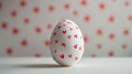 Aesthetic Easter white egg painted with red hearts. White background. Copy space. Generative AI